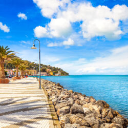 Promenade seafront or esplanade in Porto Santo Stefano harbor, Monte Argentario, Tuscany, Italy.